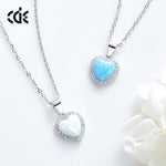 Silver opal necklace for women featuring a heart-shaped pendant with sparkling details