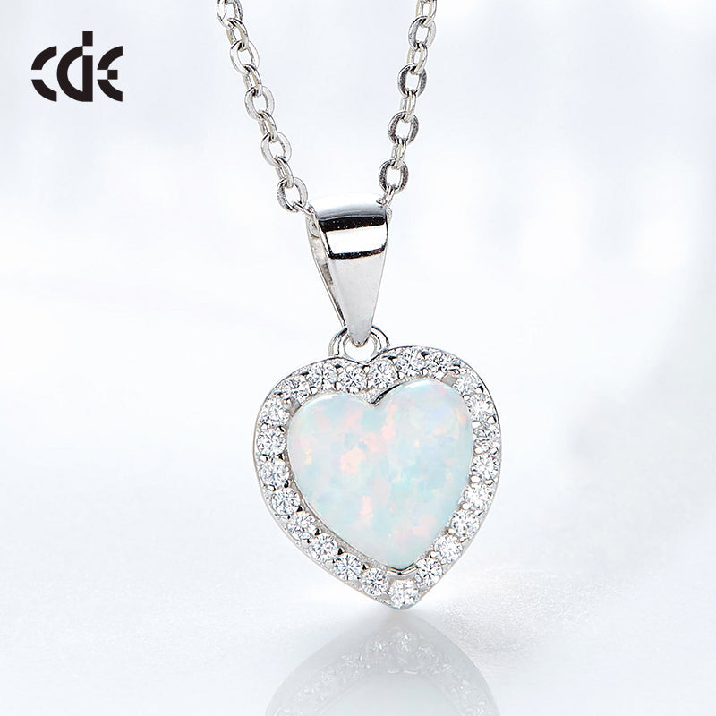 Elegant silver opal necklace for women with a heart-shaped pendant surrounded by sparkling stones
