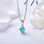 Glintzia sterling silver opal necklace featuring a stunning blue opal pendant on a delicate chain