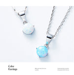 Glintzia sterling silver opal necklace featuring a stunning blue opal pendant