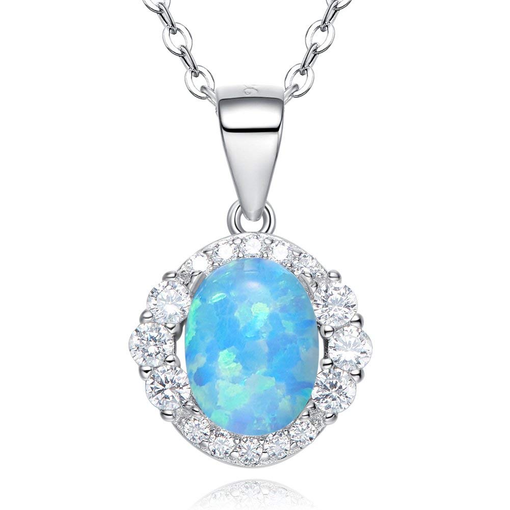 Elegant sterling silver opal necklace featuring a blue opal centerpiece surrounded by sparkling crystals