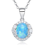 Elegant sterling silver opal necklace featuring a blue opal centerpiece surrounded by sparkling crystals
