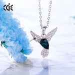 Sterling silver flying Emerald hummingbird necklace -Glintzia Jewelry