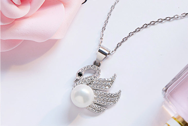 Sterling silver fancy swan with a pearl necklace -Glintzia Jewelry