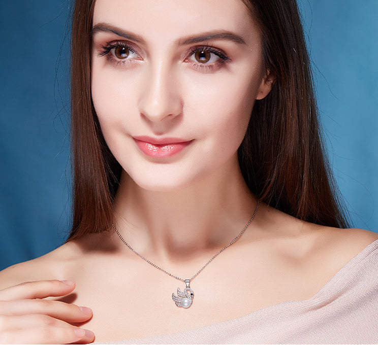 Sterling silver fancy swan with a pearl necklace -Glintzia Jewelry