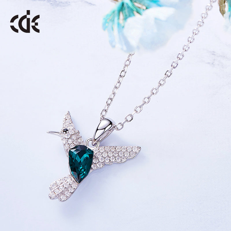 Sterling silver flying Emerald hummingbird necklace -Glintzia Jewelry