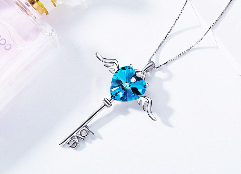 Sterling silver sapphire winged key necklace -Glintzia Jewelry