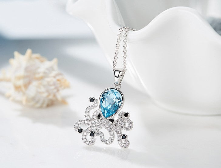 The blue topaz octopus necklace -Glintzia Jewelry