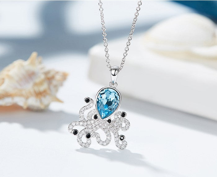 The blue topaz octopus necklace -Glintzia Jewelry