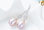 Sterling silver elegant dangling pearl earring -Glintzia Jewelry