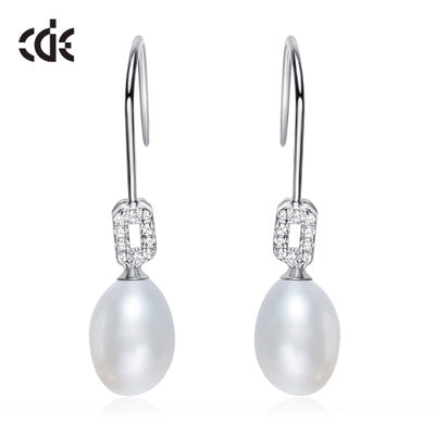 Sterling silver elegant dangling pearl earring -Glintzia Jewelry