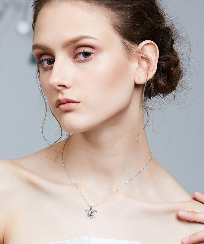 Sterling silver swimming white crystal turtle necklace -Glintzia Jewelry