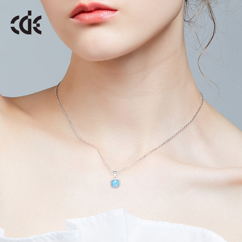 Elegant silver opal necklace on a model, perfect for those looking to buy silver opal necklace online.