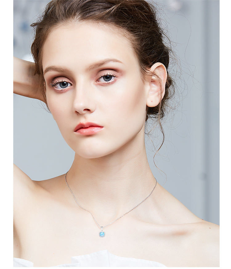 Elegant silver opal necklace worn by model showcasing its beauty, perfect to buy silver opal necklace online