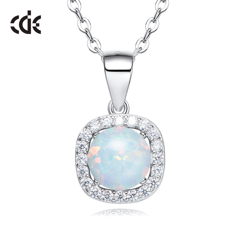 Buy silver opal necklace online featuring a radiant opal pendant surrounded by sparkling clear stones