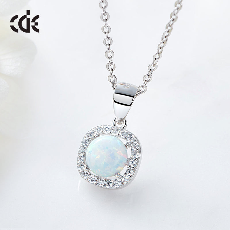 Buy silver opal necklace online featuring a stunning opal pendant surrounded by sparkling stones