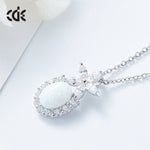 Cute flower opal pendant necklace with sparkling stones on a silver chain