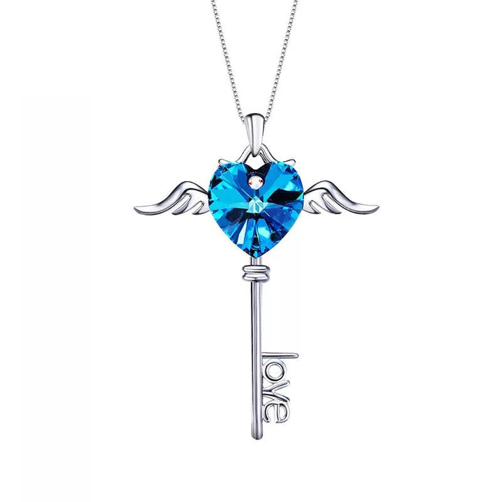 Sterling silver sapphire winged key necklace -Glintzia Jewelry