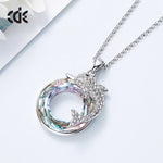 The fancy dolphin in a Sapphire / Amethyst circle necklace -Glintzia Jewelry