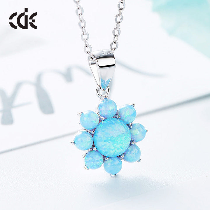 Sterling silver lab-created opal flower necklace with blue floral stones — Glintzia