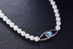 The classy pearl collier with a blue topaz swarovski pendant -Glintzia Jewelry