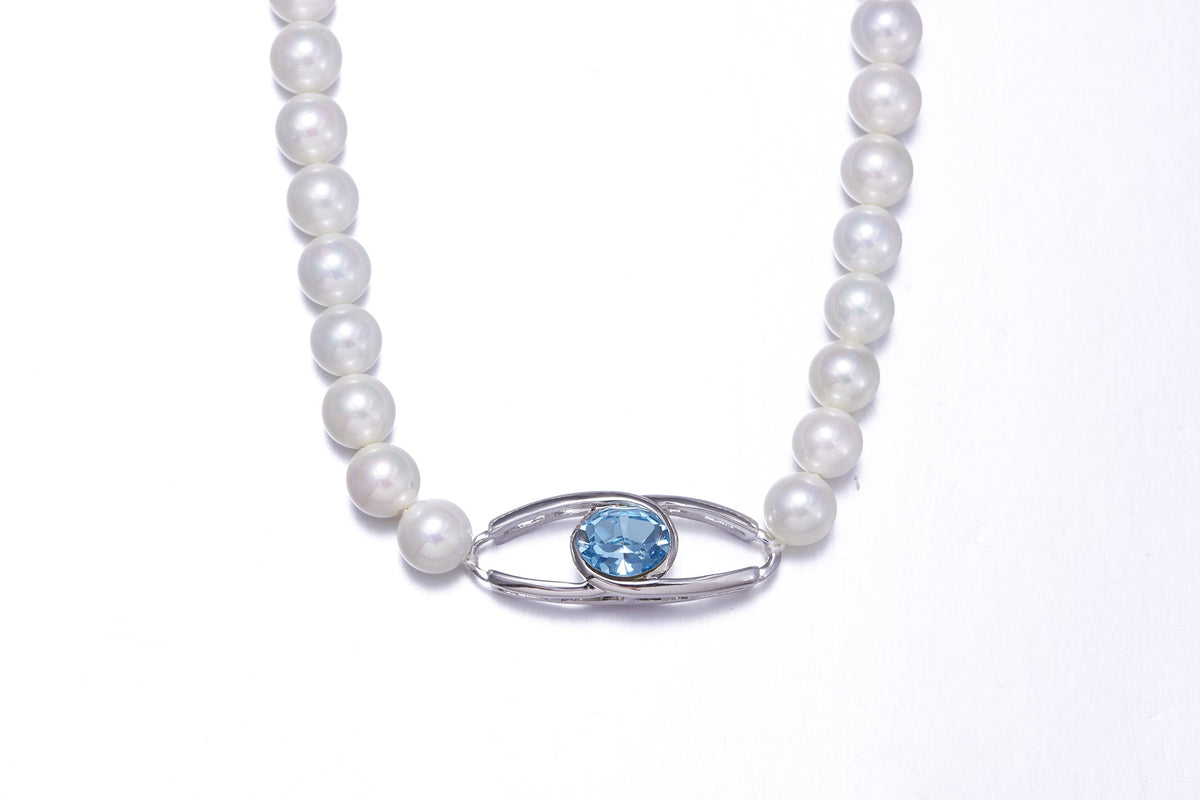 The classy pearl collier with a blue topaz swarovski pendant -Glintzia Jewelry